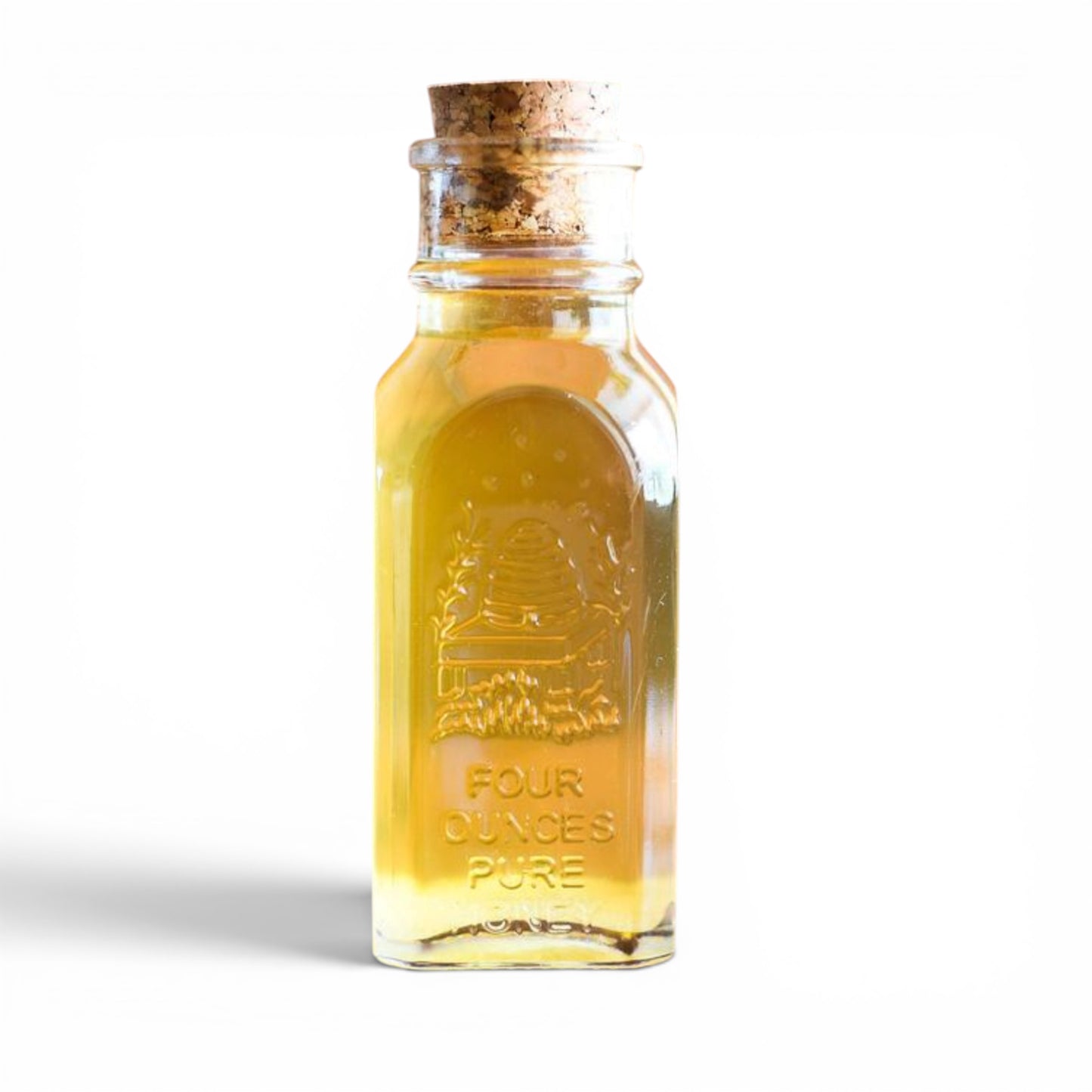 Honey Filled in an embossed glass jar with cork. Great for Gifts!